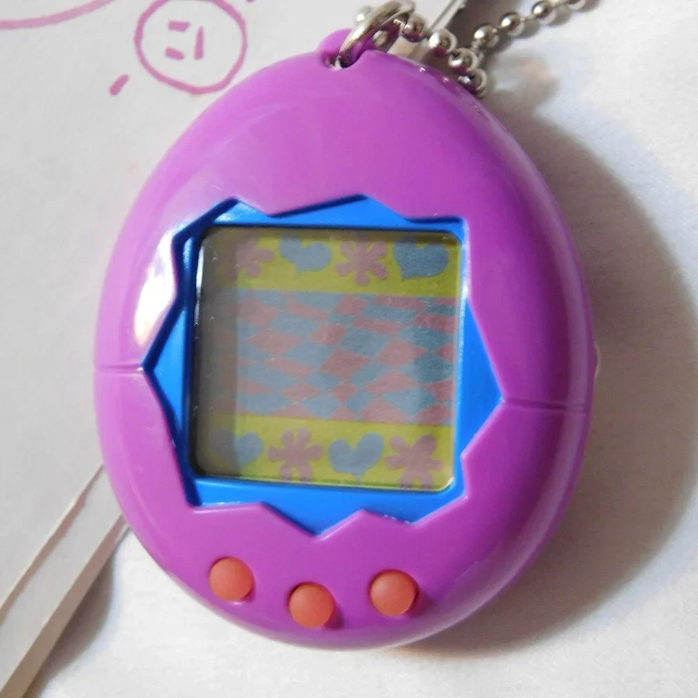 Bandai TAMAGOTCHI Electronic Virtual Reality Pet 1997 Purple